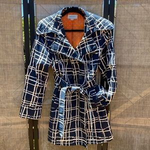 Lightweight double breasted trench coat.